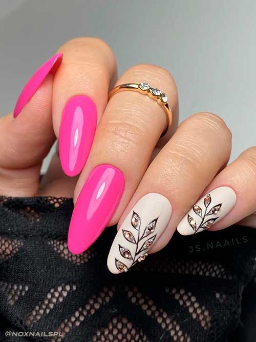 Long Almond Pink Neon Nails with Glittery Leaf Nail Art on Two Off White Accents for Summer 2022