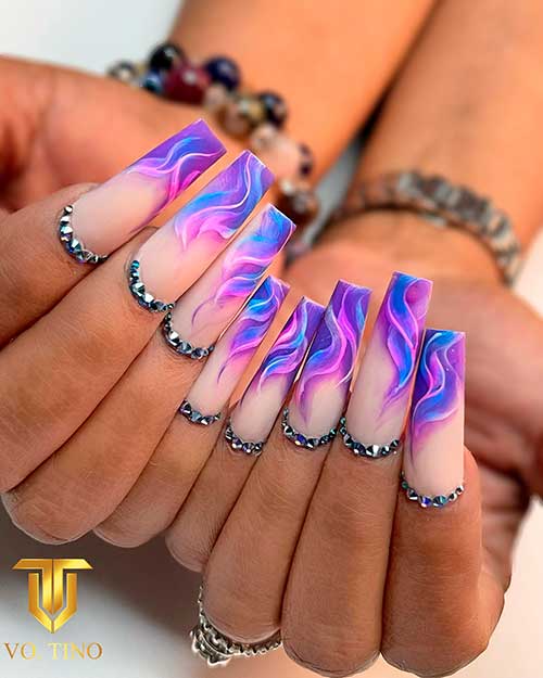 Long Nude Nails with Blue, Pink< and Purple Flames on Tips for Summer 2022