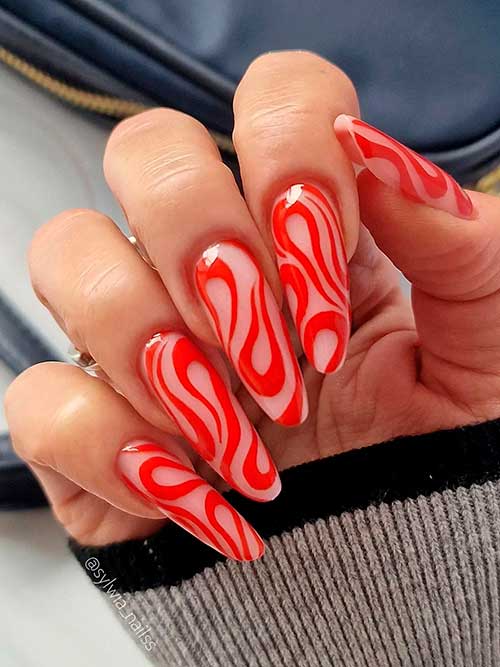 Long Almond Red Swirl Nails on Nude Base Color - The Cutest Swirl Nail Designs for Summer 2022