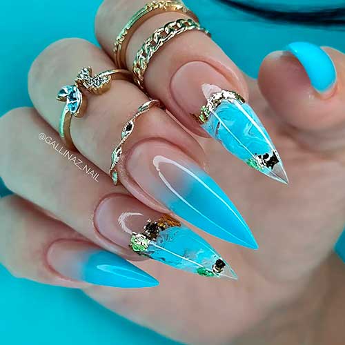 Long Stiletto Shaped Sea Blue Ombre Nails with Gold Decorations