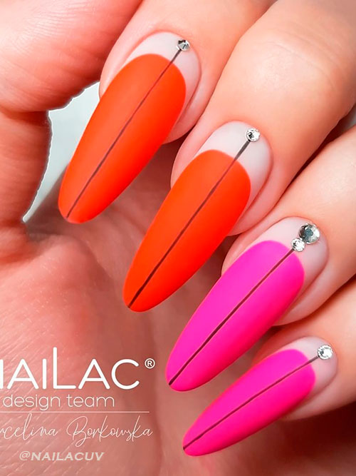 Long Round Pink with Red Neon Nails Adorned with Black Center Lines and Rhinestones on Nude Base Area Above Cuticles