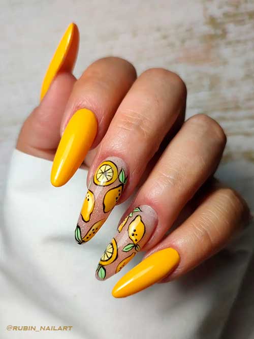 Gel yellow nails with citrus fruits on two accents Long almond shaped gel yellow nails with citrus fruits on two accents
