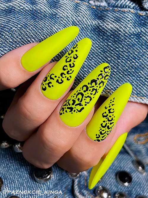 Long almond shaped matte neon yellow nails with leopard prints for summer 2022