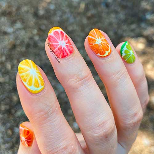 Short multi color citrus fruit nails for summer 2022
