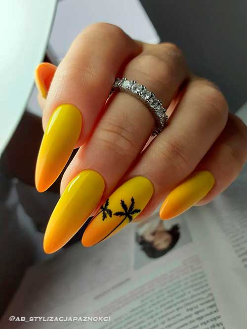 Long almond tropical yellow ombre nails with black palms on accent nail for summer 2022