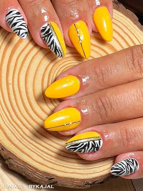 Yellow summer nails with zebra prints