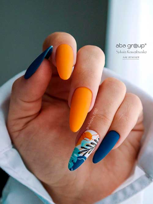Long Almond Shaped Autumnal Navy Blue and Orange Nails with An Accent Leaf Nail