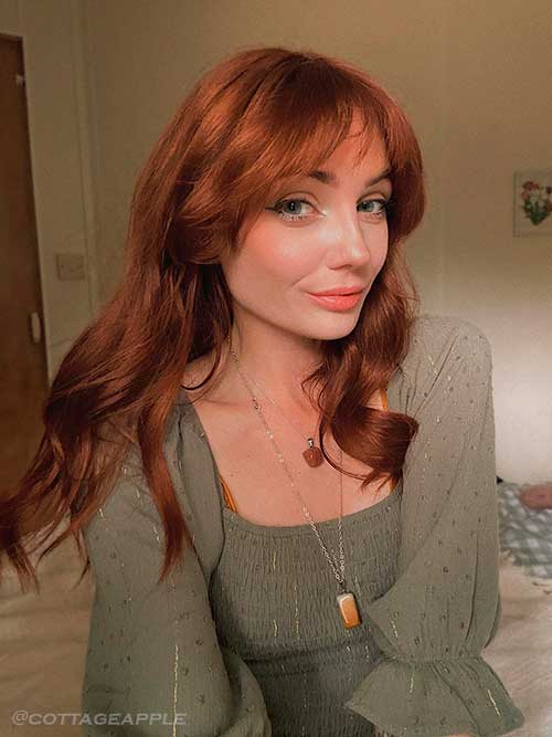 Autumnal long auburn hair color