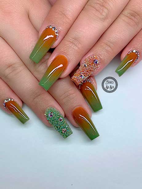 Long Coffin Shaped Brown to Olive Green Ombre Nails with Rhinestones and Two Glitter Accent Nails