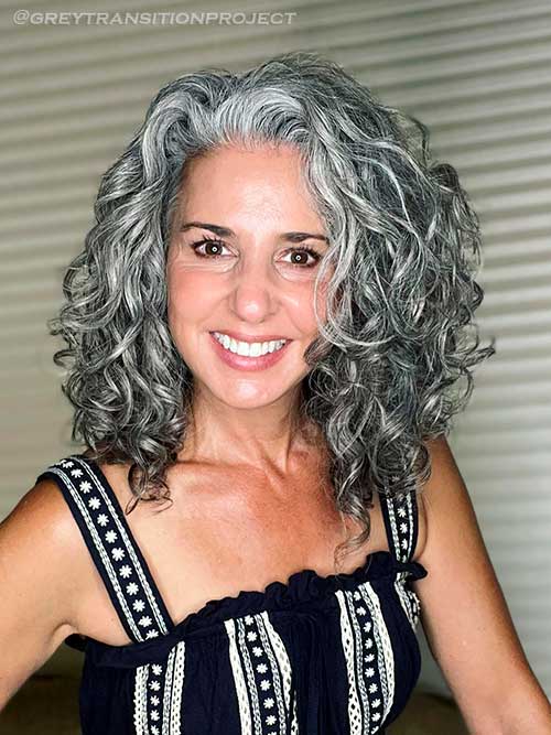 Curly hair with salt and pepper hair color for Fall 2022
