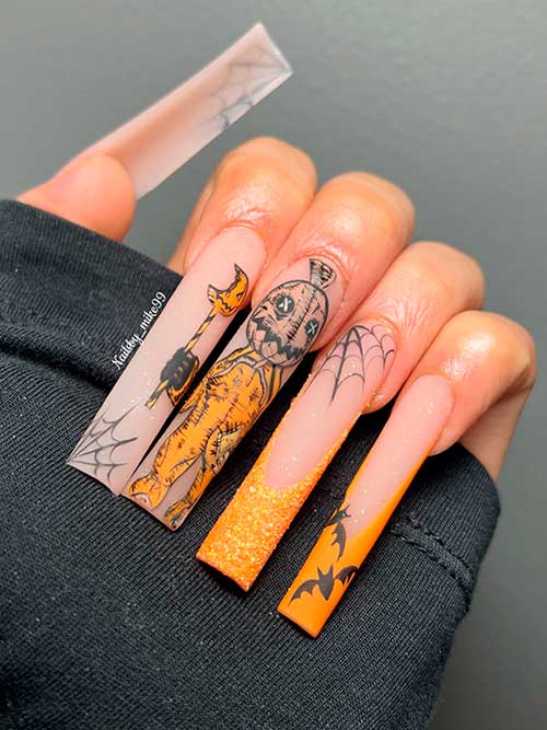 Long Matte Orange French spooky Halloween nails with glitter, corpse, bats, and spider web nail art