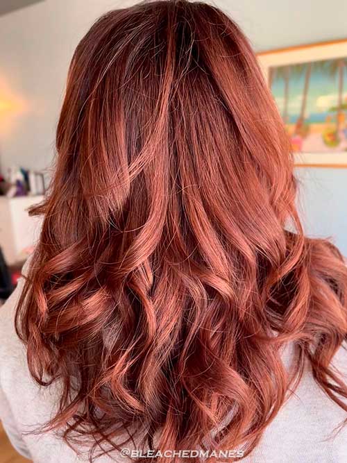 Long hair dyed auburn color for Fall 2022