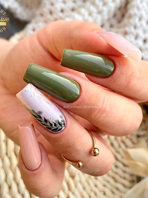 Long square shaped olive nails with leaf nail art and nude accents for fall 2022