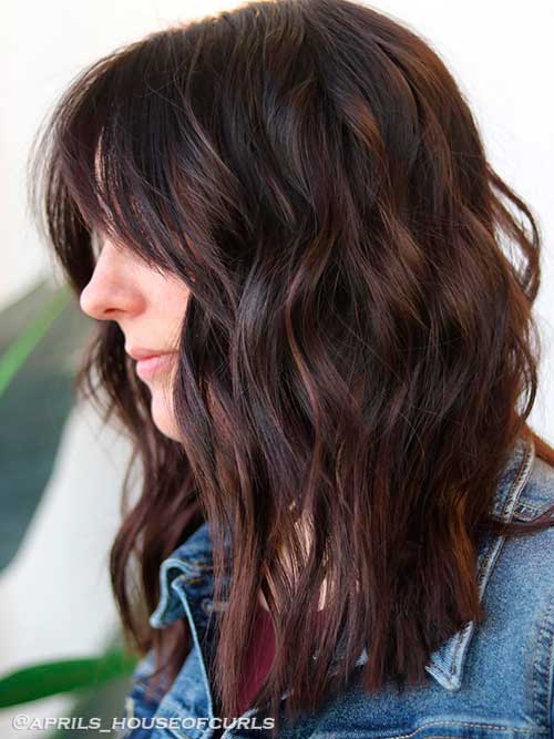 Rich brunette Fall hair colors with a hint of copper