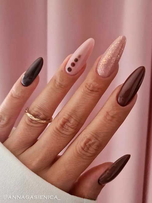 Brown with Nude Nail Design Long almond brown with Nude Nail Design adorned with glitter