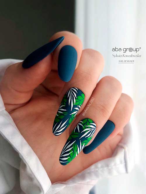 Matte Navy Blue Nails with Leaf Nail Art Long Almond Shaped Matte Navy Blue Nails with White and Green Leaf Nail Art