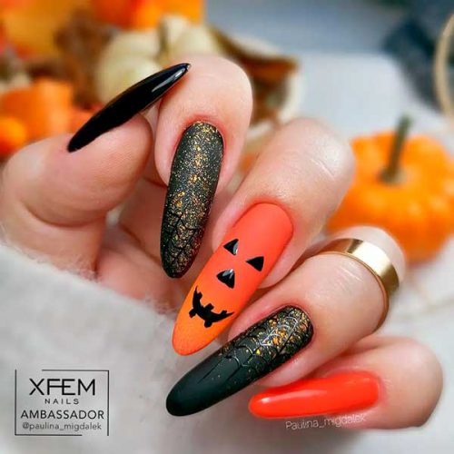Black and Orange Halloween Nail Art Design with Gold Glitter and Accent Ombre Orange Nail