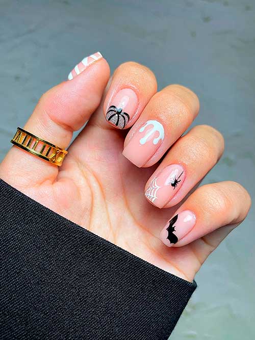 Short Square Simple Nude Halloween Nails Features pumpkin, blood drip nail art, corpse, bat, spider, and spider web