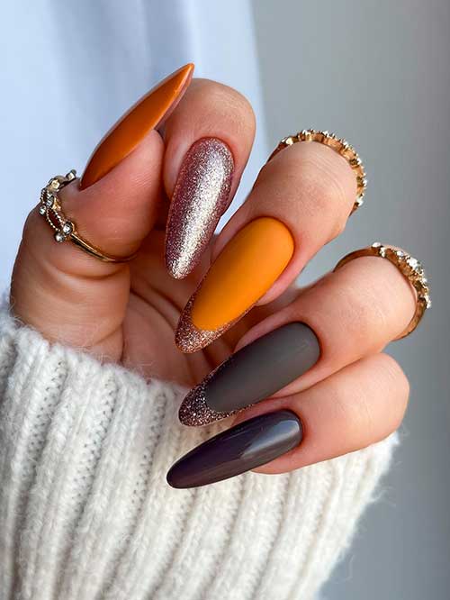 Long Almond Matte Brown and Burnt Orange November Nails with Rose Gold Glitter French Tips and Accent Glitter Nail