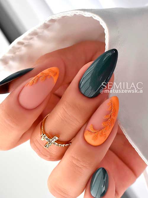 Almond Shaped Dark Green November Nails 2022 with Glittery Orange Leaf Nail Art on Two Accent Nails