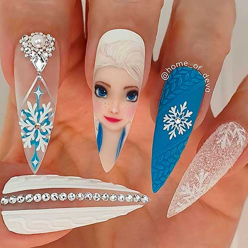 Elsa Christmas Nails with Snowflakes Long Stiletto White and Blue Elsa Christmas Nails with Snowflakes Nail Design is One of The Cutest Disney Christmas Nails