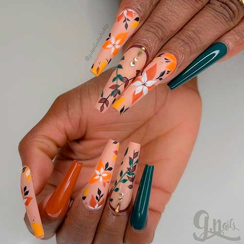 Long Coffin Shaped Fall Leaf Nails with Blooms on Nude Nails with Dark Green and Burnt Orange Accent Nails