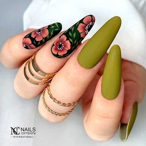 Matte olive green and black November nails 2022 with floral and leaf nail art for fall 2022