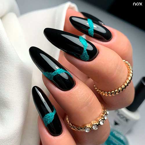 Long Almond Black Winter Nails with Glitter Emerald Touches