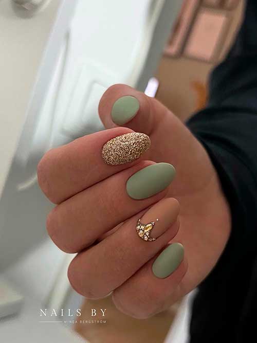 Short Matte Olive Green November Nails with Gold Glitter and Rhinestones on Accent Nude Nail