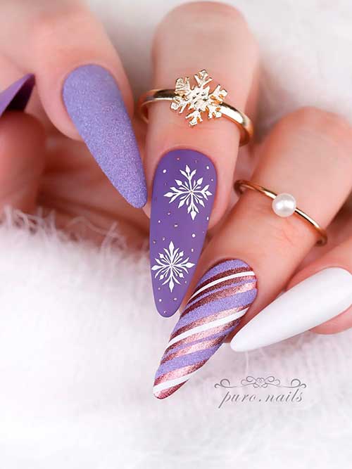 Long Almond Shaped Purple and White Christmas nails with Snowflakes and Candy Cane Accent Nails
