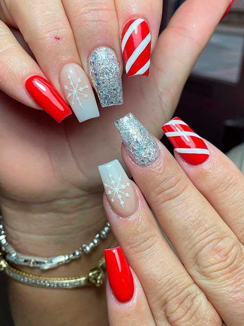 Red Coffin Christmas Acrylic Nails Red Coffin Christmas Acrylic Nails with Candy Cane, Snowflake, and Silver Glitter Accent Nails