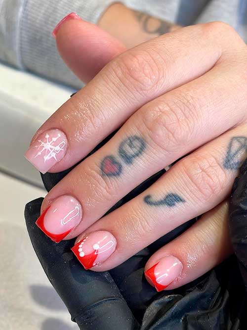 Short Red French Classy Christmas Acrylic Nails with Snowflake and Santa's Hat on Accent Nails Short Red French Classy Christmas Acrylic Nails with Snowflake and Santa's Hat on Accent Nails