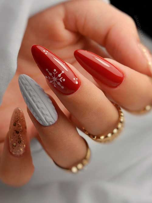 Long Almond Shaped Red Nails with Snowflakes, Sweater, and Gold Glitter Accent Nails for Winter 2023