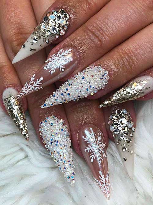 Long Stiletto Christmas Acrylic Nails with Silver and Sugar Glitter and Snowflakes on An Accent Nail