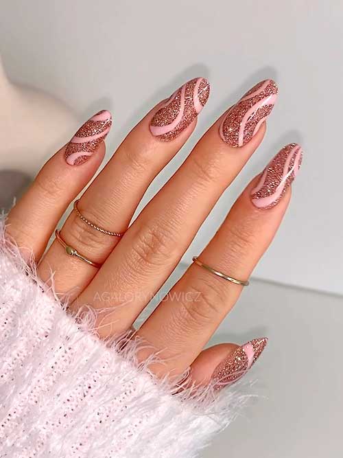 Medium round shaped brown glitter nails with pink swirls for winter 2023
