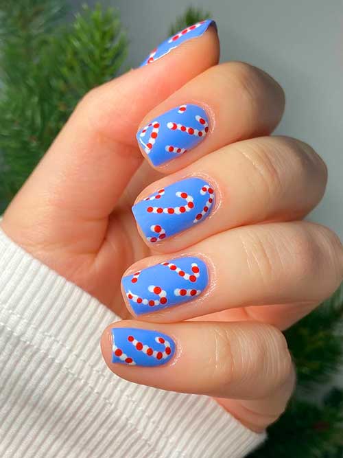 Short Candy Cane Simple Christmas Nails over Matte Blue Base Color