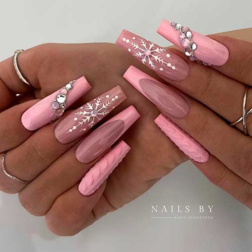 Long coffin-shaped pink winter nails with snowflakes and rhinestones and French accent nails