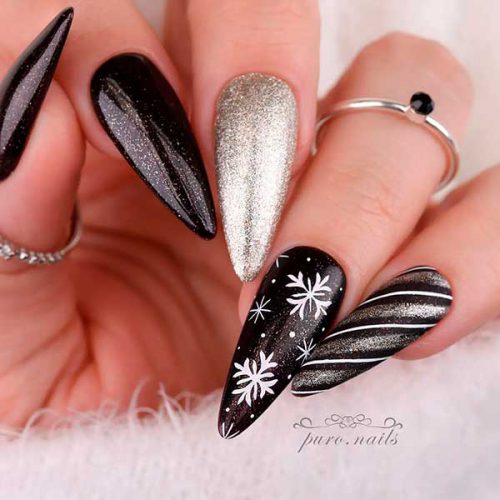 Long Almond Shaped Christmas Black and Silver Glitter Nails are Considered One of The Best Classy Black Nail Designs