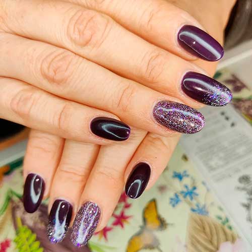 Long Round Shaped Glossy Dark Purple Nails with Glitter