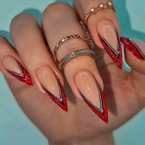 French Red and Black New Year Nails Long Stiletto French Glitter Red and Black Nails with Rhinestones for The New Year Occasion