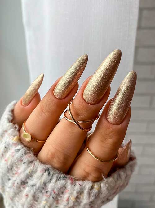 Long Almond Shaped Gold Glitter New Years Nails 2023