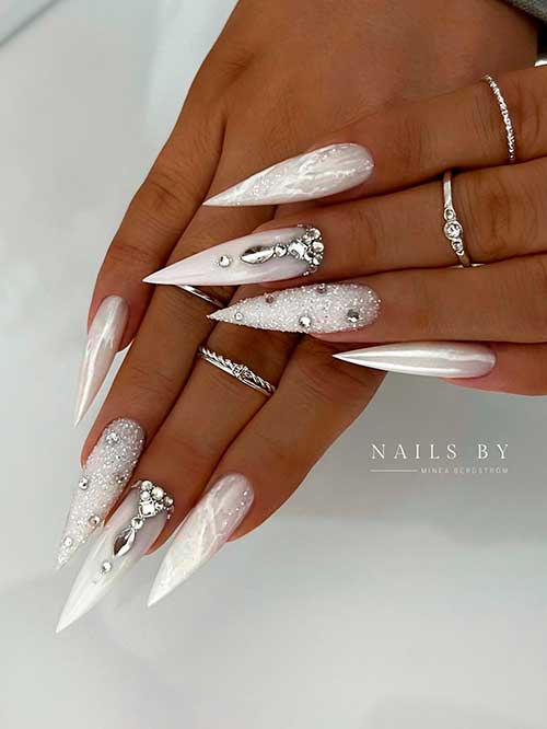 Long Stiletto Milky White Winter Nails with Glitter, Rhinestones, Chrome, and Marble Nail Art