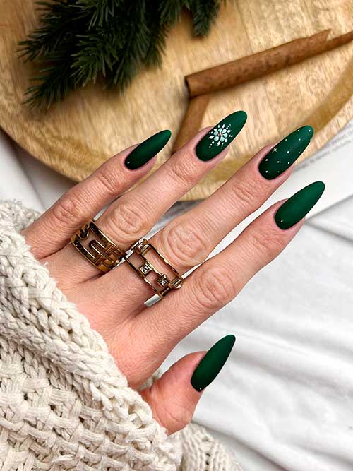 Matte Dark Green Christmas Nails with White Polka Dot, Rhinestones, and A Snowflake