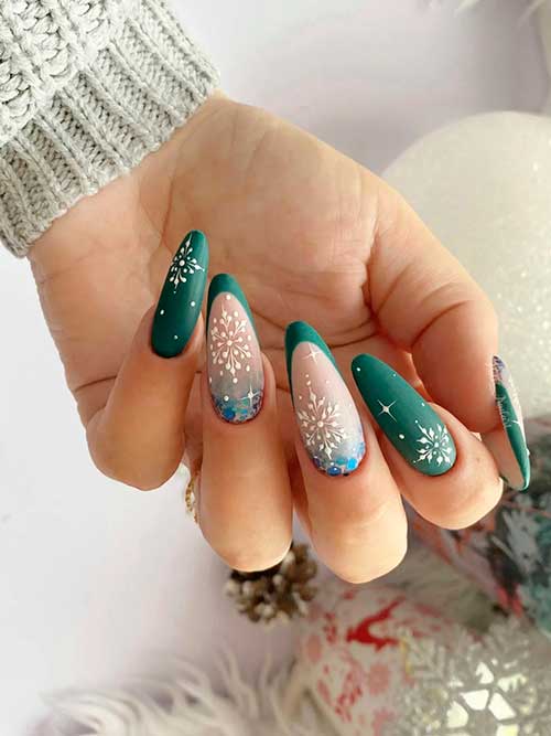 Long Almond Shaped Matte French Dark Green Christmas Nails with Snowflakes and Blue Glitter Above the French Tip Nails Cuticles