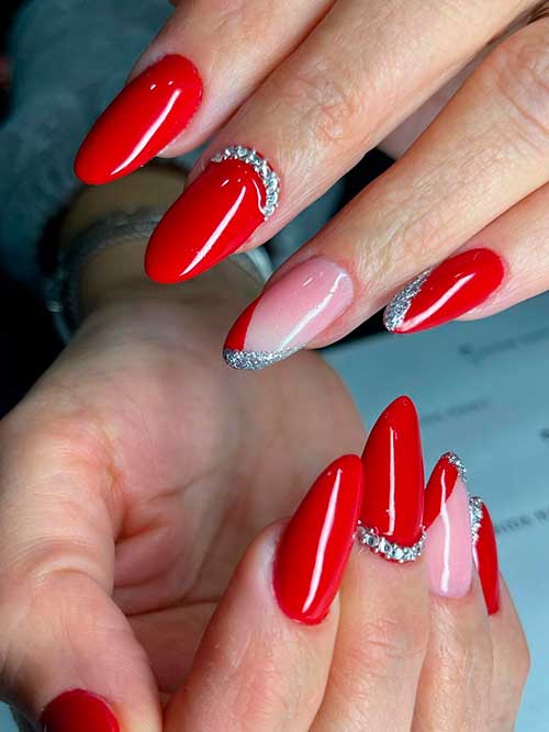 Medium Round Red Nails with Silver Rhinestones and Gold Glitter on Accent French Tips
