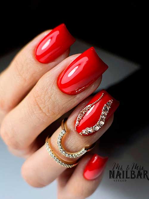Medium Square Red Nails With Gold Rhinestones and Crystals are One of The Cutest Red Nail Designs to Try