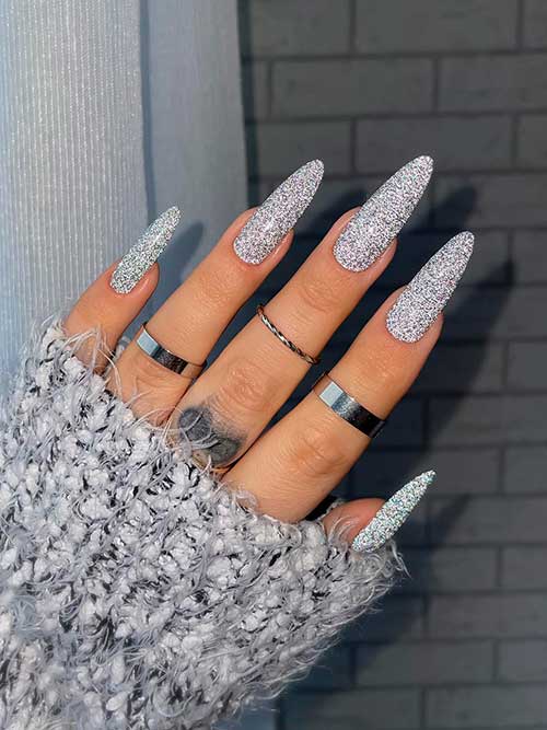Silver glitter new years nails Long almond shaped Silver glitter new years nails 2023