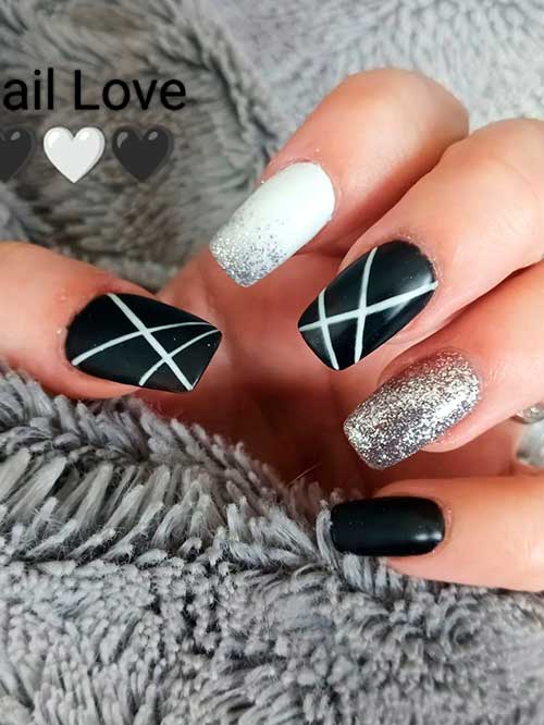 Medium square geometric black nails with silver glitter and white accent nails with silver glitter for new years
