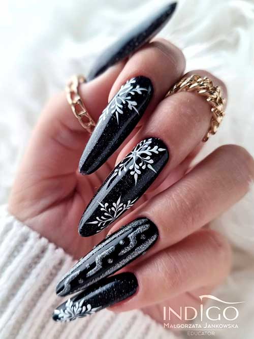 Long Almond Shaped Black Nails with Snowflakes, Glitter, and Sweater Nail Art for Winter 2023