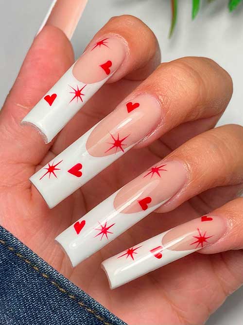 Long square shaped white French tip valentines nails 2023 with red hearts and stars